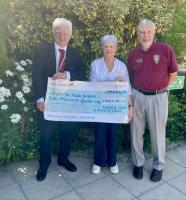 Elaine is pictured presenting a cheque to Richard Soulsby, Chief Executive of Katharine House Hospice alongside Past President Geoff